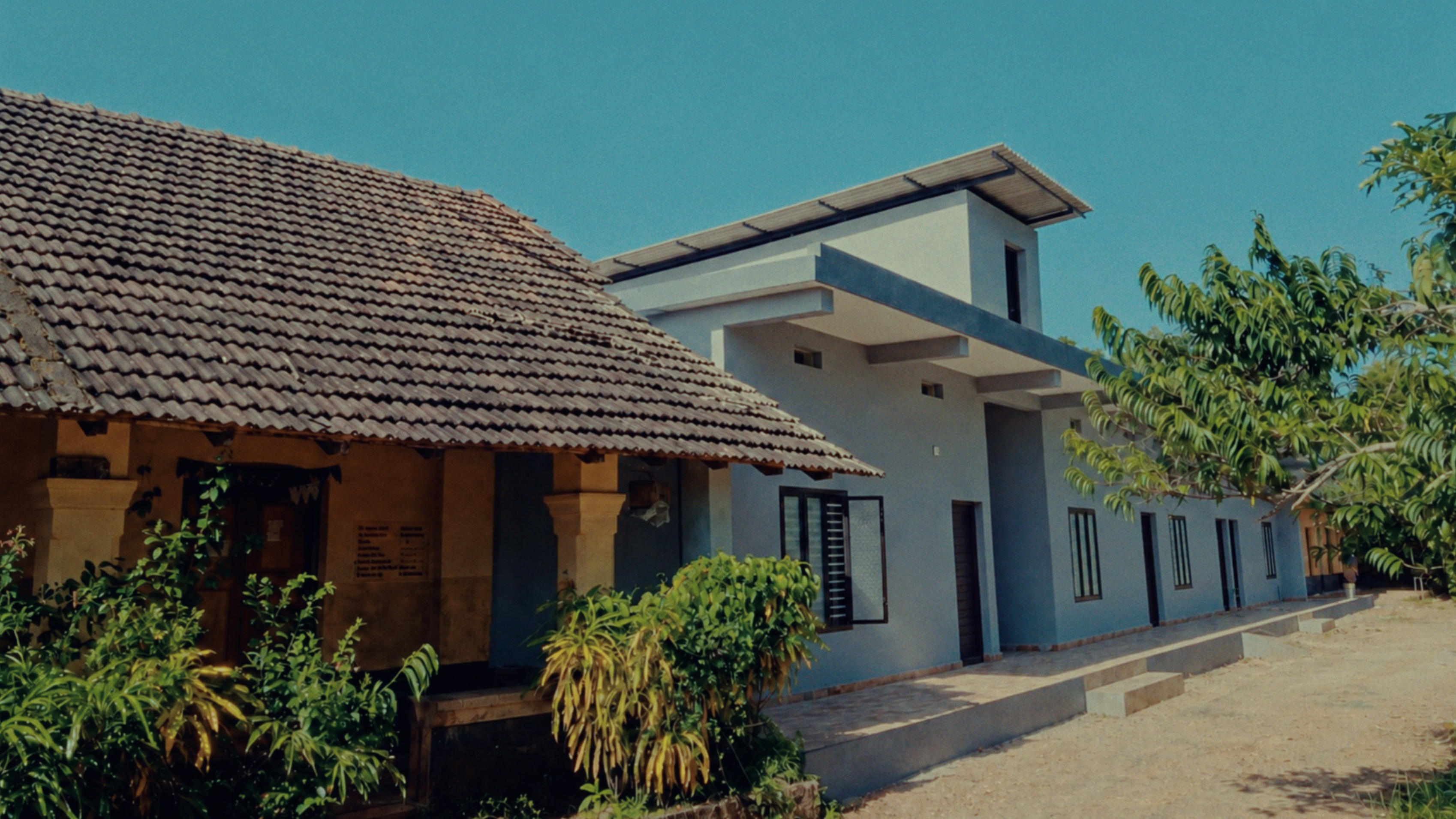 AUP School Pallathadka campus with its traditional tiled building and newer school block